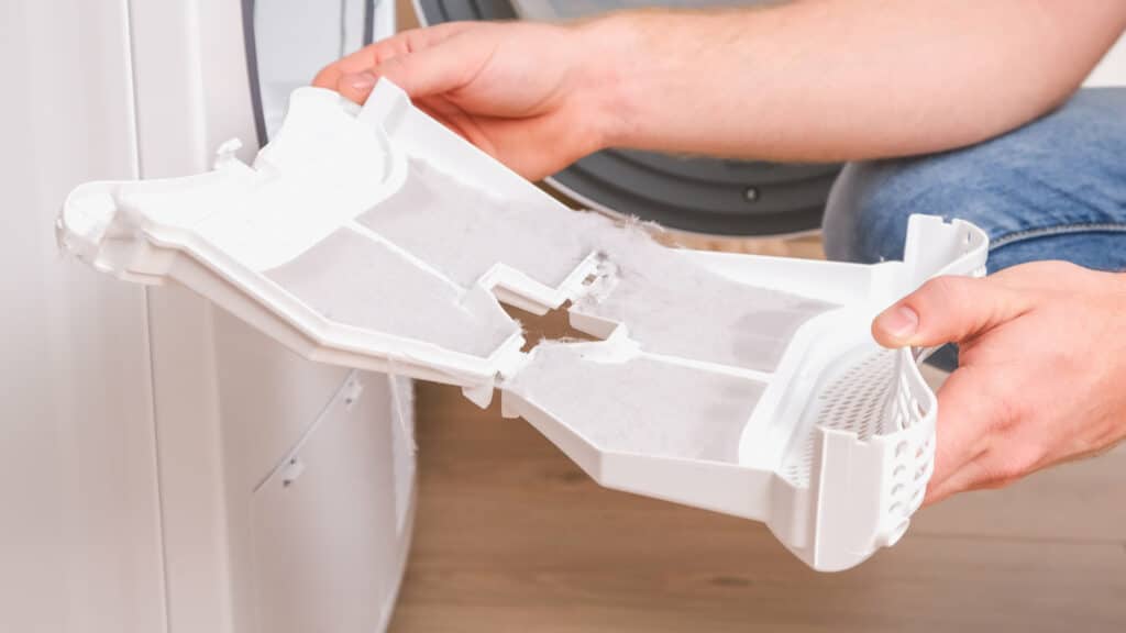 How To Properly Clean a Dryer Lint Trap - Register Appliance Service